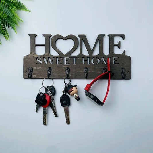 Black metal key hanger with sleek modern design for organized entryway